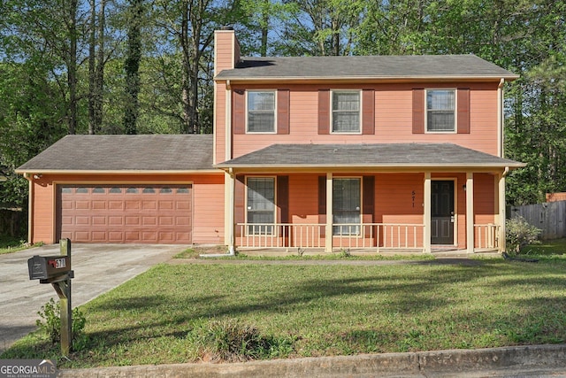 view of front of home with covered porch, a front yard, an attached garage, a chimney, and driveway