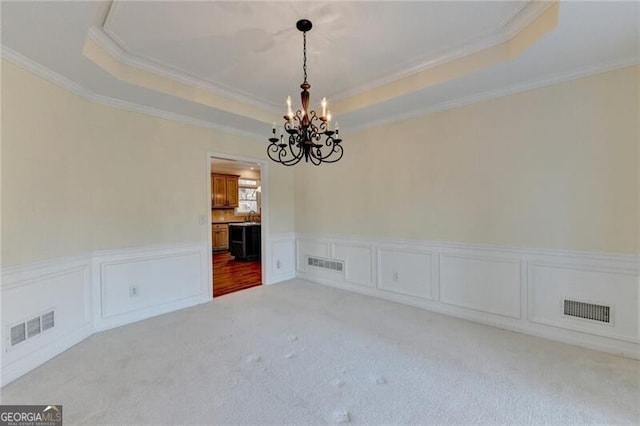 unfurnished dining area with an inviting chandelier, visible vents, and ornamental molding