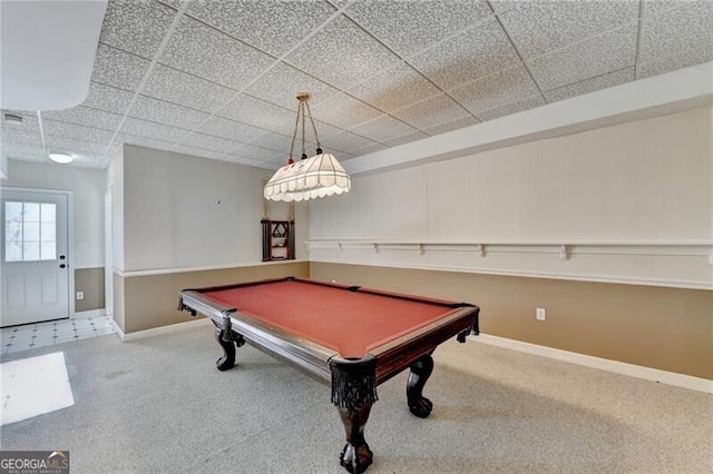 game room featuring a paneled ceiling, pool table, carpet, and baseboards
