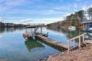 view of dock with a water view