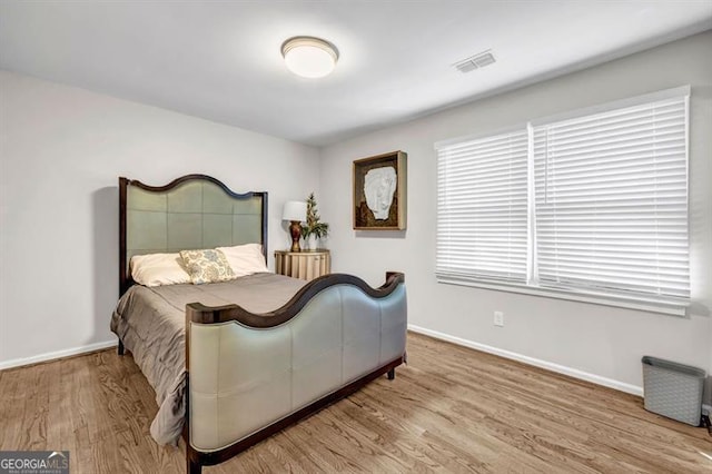3139 Players Dr, Jonesboro, GA 30236 - bedroom featuring wood finished floors and baseboards