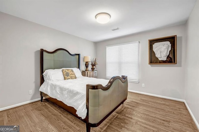 3139 Players Dr, Jonesboro, GA 30236 - bedroom with wood finished floors and baseboards