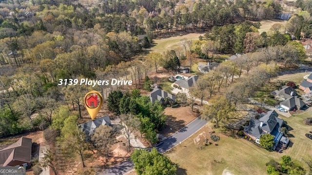 3139 Players Dr, Jonesboro, GA 30236 - aerial view of property and surrounding area featuring a forest