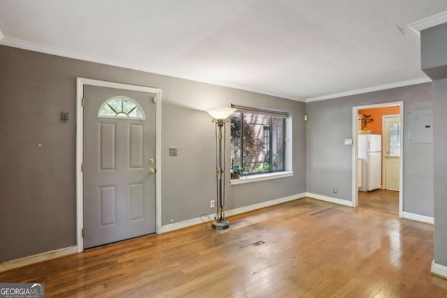 702 Argonne Ave NE Unit 1, Atlanta, GA 30308 - foyer featuring ornamental molding, wood finished floors, and electric panel