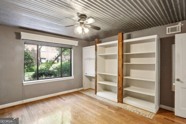 702 Argonne Ave NE Unit 1, Atlanta, GA 30308 - unfurnished bedroom with baseboards and wood finished floors