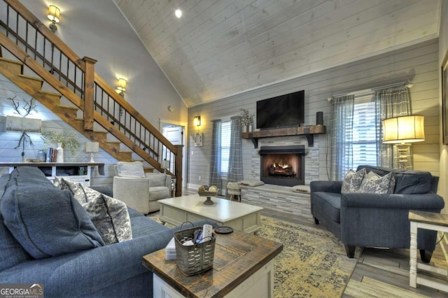 517 Monet Dr Unit 1144R, Ellijay, GA 30540 - living room featuring high vaulted ceiling, wood finished floors, stairway, a stone fireplace, and wood ceiling