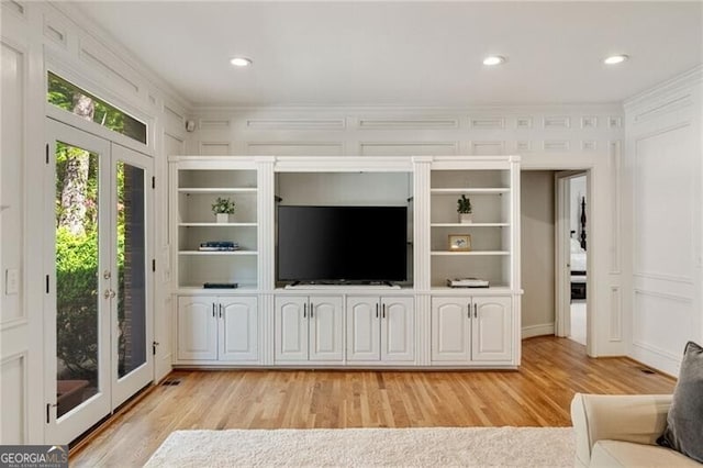 5520 Glen Errol Rd, Atlanta, GA 30327 - unfurnished living room with light wood-style floors, french doors, recessed lighting, and a decorative wall