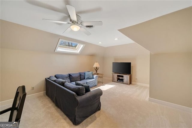 5520 Glen Errol Rd, Atlanta, GA 30327 - living area featuring a skylight, light carpet, lofted ceiling, ceiling fan, and recessed lighting