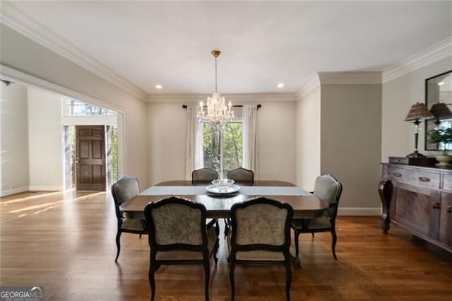 5520 Glen Errol Rd, Atlanta, GA 30327 - dining room with a chandelier, wood finished floors, recessed lighting, and ornamental molding