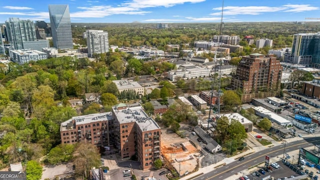 drone / aerial view featuring a city view