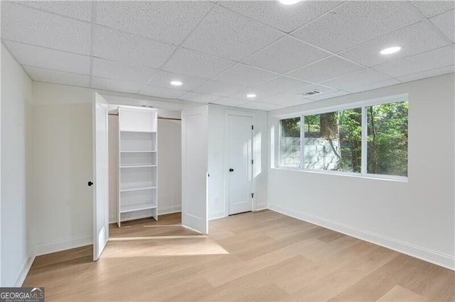 808 Sherwood Rd, Gainesville, GA 30501 - unfurnished bedroom with light wood-style floors, two closets, a drop ceiling, and recessed lighting