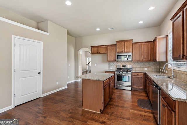 4580 Orchard Ridge Ct, Cumming, GA 30028 - kitchen with tasteful backsplash, a kitchen island, visible vents, appliances with stainless steel finishes, and a sink