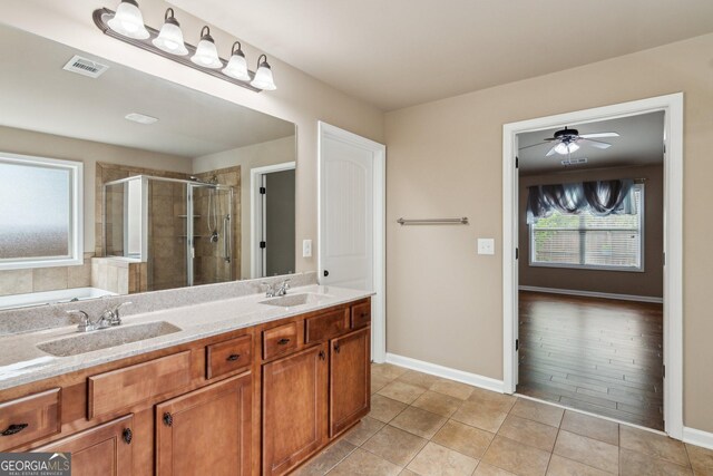4580 Orchard Ridge Ct, Cumming, GA 30028 - bathroom with a sink, visible vents, baseboards, and a shower stall