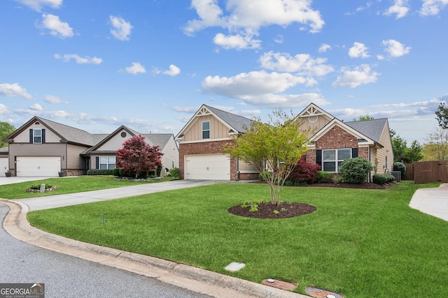 4580 Orchard Ridge Ct, Cumming, GA 30028 - view of front of house with board and batten siding, a front yard, an attached garage, and concrete driveway