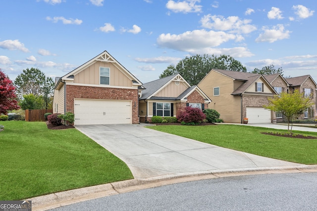 4580 Orchard Ridge Ct, Cumming, GA 30028 - craftsman inspired home featuring concrete driveway, board and batten siding, brick siding, a garage, and fence