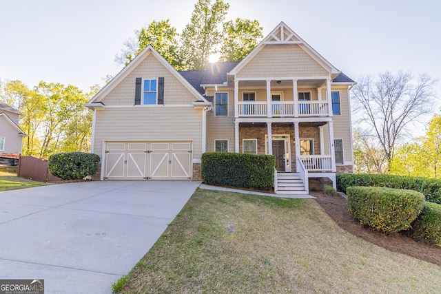 288 Pine Way, Dallas, GA 30157 - view of front of property featuring covered porch, a garage, concrete driveway, a front lawn, and a balcony