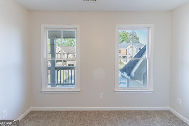 288 Pine Way, Dallas, GA 30157 - carpeted empty room with baseboards and a healthy amount of sunlight
