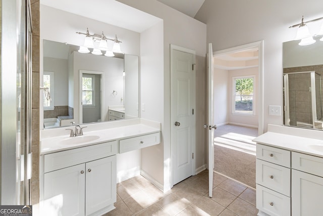 288 Pine Way, Dallas, GA 30157 - full bathroom with two vanities, tile patterned flooring, a sink, a stall shower, and baseboards