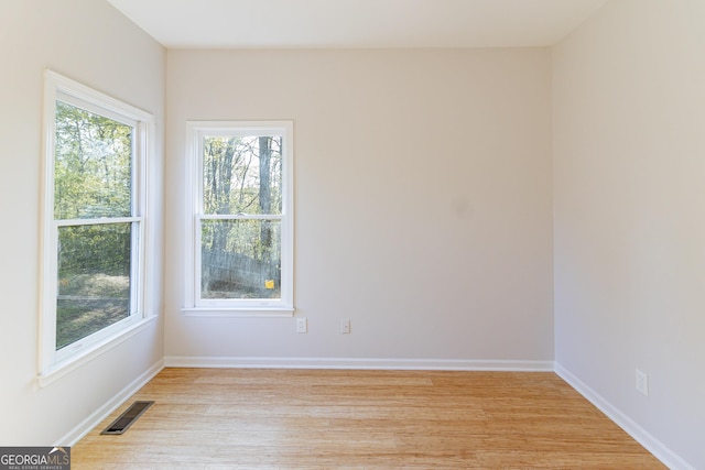 288 Pine Way, Dallas, GA 30157 - empty room featuring light wood-style floors, baseboards, and visible vents