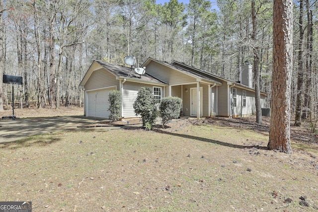 1109 Allen Rd, Grantville, GA 30220 - ranch-style home with an attached garage and a chimney