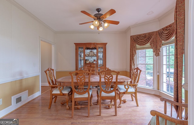 516 Turner Rd, Concord, GA 30206 - dining area featuring light wood finished floors, ceiling fan, crown molding, and baseboards