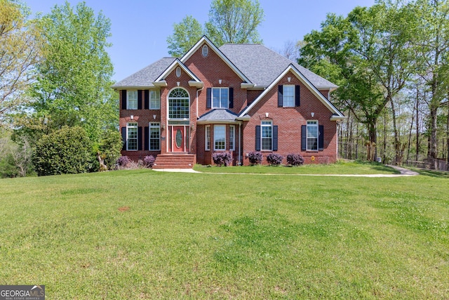 516 Turner Rd, Concord, GA 30206 - view of front of home with brick siding and a front yard