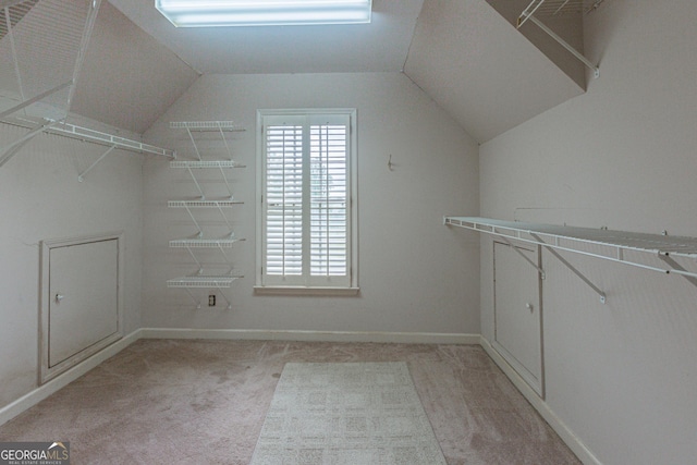 516 Turner Rd, Concord, GA 30206 - walk in closet with light carpet and lofted ceiling