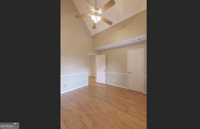 516 Turner Rd, Concord, GA 30206 - unfurnished room featuring wood finished floors, ceiling fan, high vaulted ceiling, and baseboards