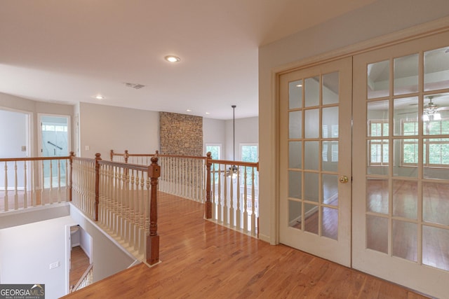 516 Turner Rd, Concord, GA 30206 - corridor with wood finished floors, healthy amount of natural light, recessed lighting, and an upstairs landing