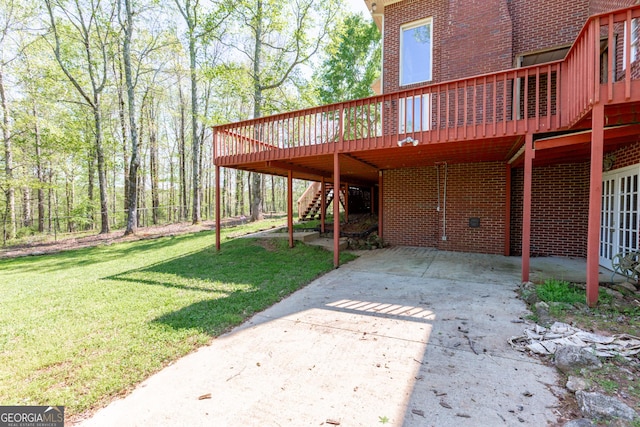 516 Turner Rd, Concord, GA 30206 - view of patio / terrace featuring driveway, a wooden deck, stairs, and a carport