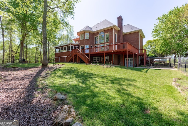 516 Turner Rd, Concord, GA 30206 - back of house with stairway, a wooden deck, brick siding, a chimney, and a sunroom