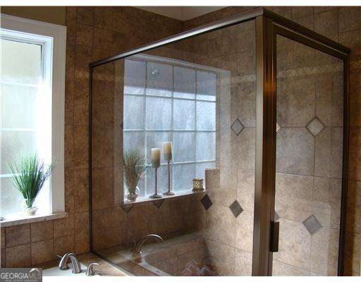 113 Sunrise Ln, Savannah, GA 31419 - full bathroom with tiled shower and a garden tub