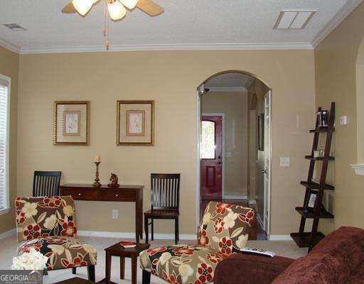 113 Sunrise Ln, Savannah, GA 31419 - interior space featuring arched walkways, visible vents, and crown molding