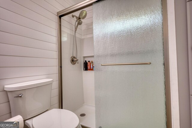480 Friar Tuck Cir, Covington, GA 30014 - bathroom with toilet and a shower stall