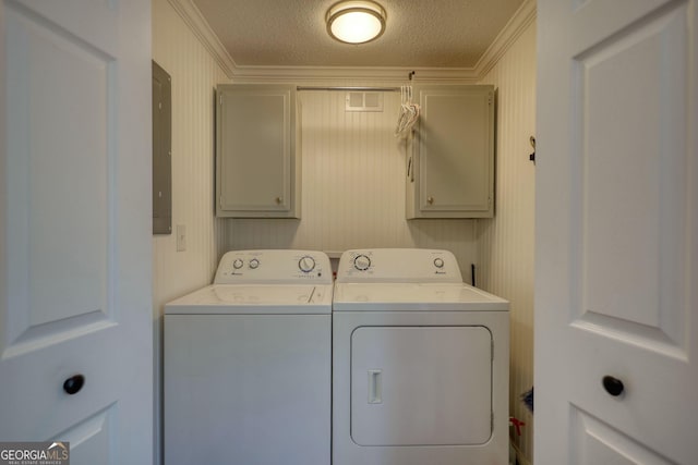 480 Friar Tuck Cir, Covington, GA 30014 - washroom with separate washer and dryer, a textured ceiling, crown molding, and cabinet space