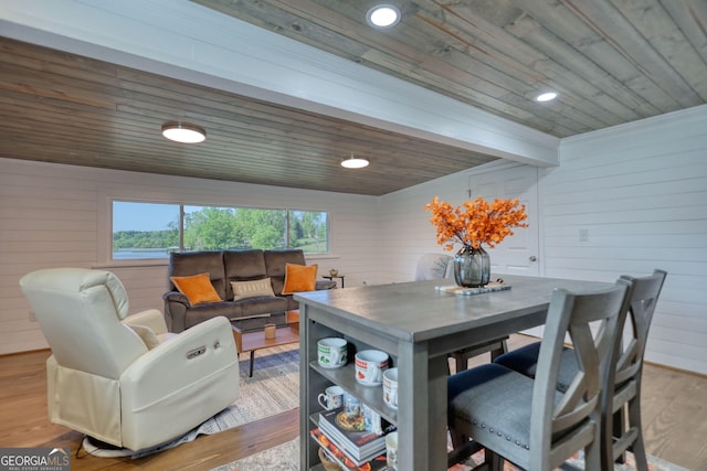480 Friar Tuck Cir, Covington, GA 30014 - dining room featuring wooden ceiling, wooden walls, and wood finished floors