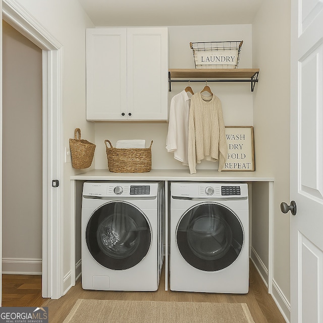 8660 Anchor On Lanier Ct, Gainesville, GA 30506 - washroom with separate washer and dryer, cabinet space, and baseboards