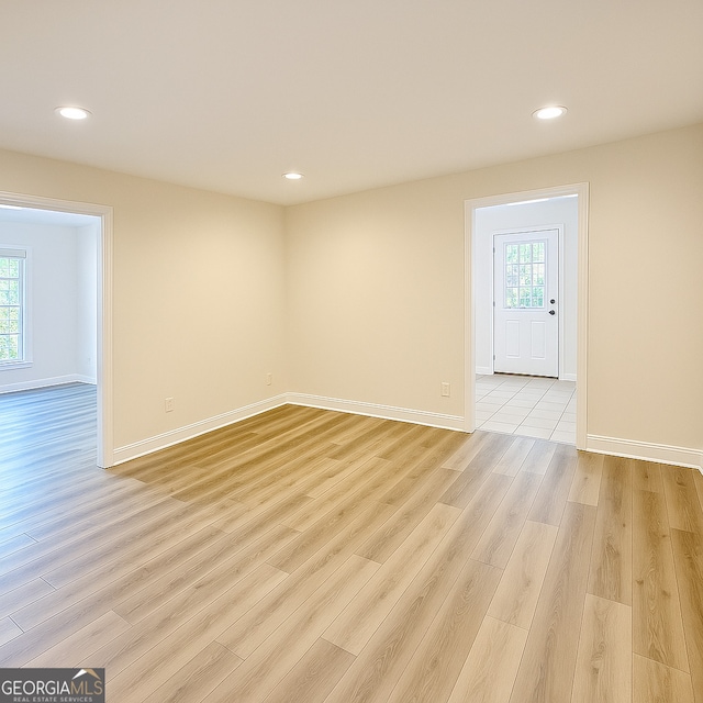 8660 Anchor On Lanier Ct, Gainesville, GA 30506 - spare room featuring light wood-style floors, recessed lighting, and baseboards