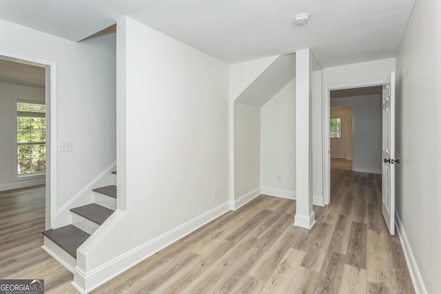 8660 Anchor On Lanier Ct, Gainesville, GA 30506 - stairs featuring wood finished floors, baseboards, and healthy amount of natural light