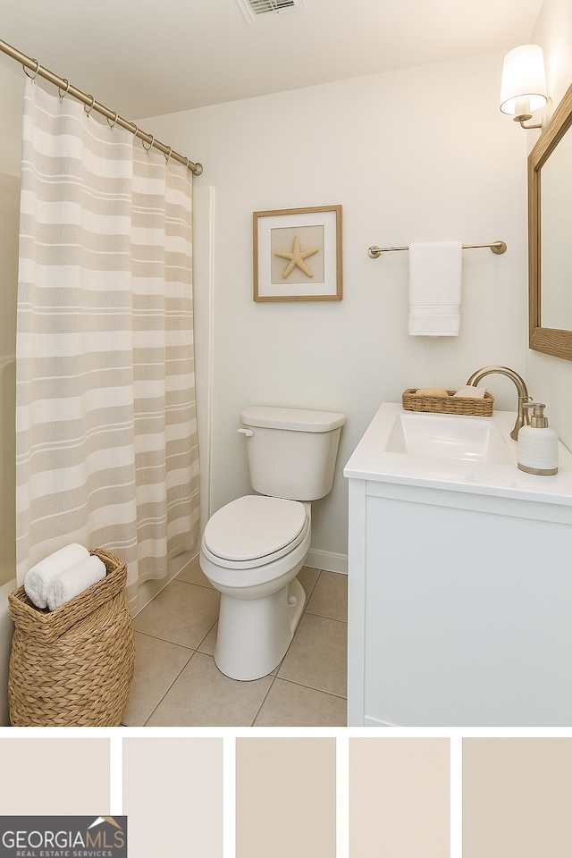 8660 Anchor On Lanier Ct, Gainesville, GA 30506 - bathroom featuring toilet, vanity, and tile patterned floors