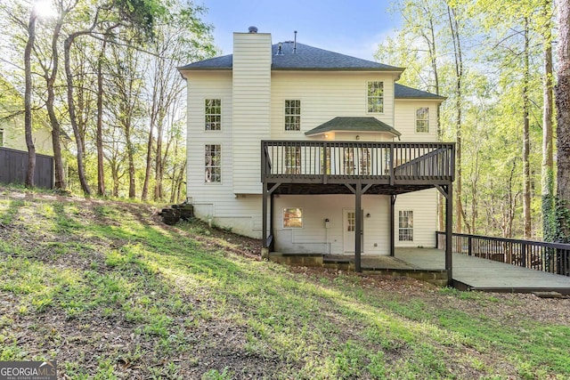 8660 Anchor On Lanier Ct, Gainesville, GA 30506 - rear view of property with a deck, a chimney, and a shingled roof