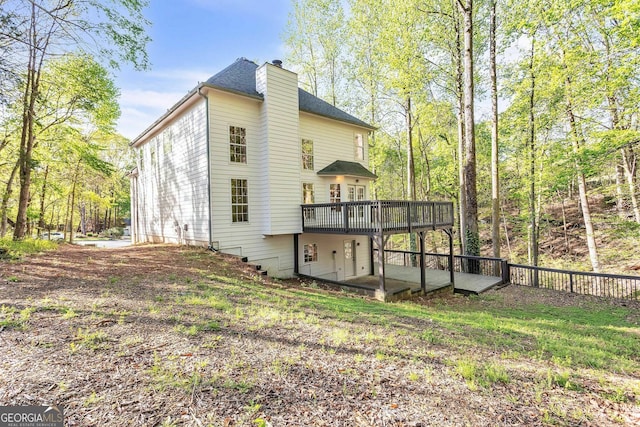 8660 Anchor On Lanier Ct, Gainesville, GA 30506 - rear view of property featuring a deck and a chimney