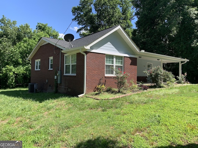 2467 Shady Grove Rd, Carrollton, GA 30116 - view of side of home with brick siding, cooling unit, and a yard