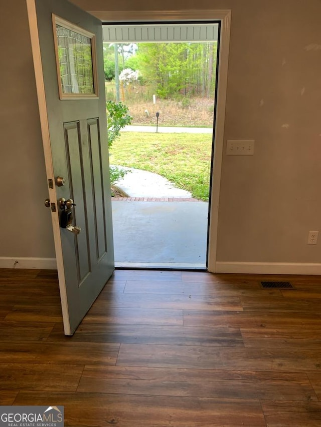 2467 Shady Grove Rd, Carrollton, GA 30116 - foyer entrance with baseboards and wood finished floors