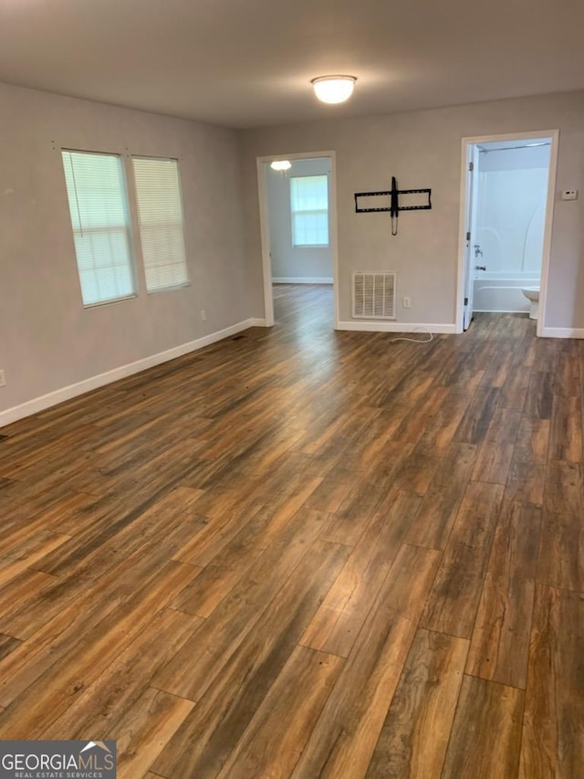 2467 Shady Grove Rd, Carrollton, GA 30116 - unfurnished room with dark wood finished floors and baseboards