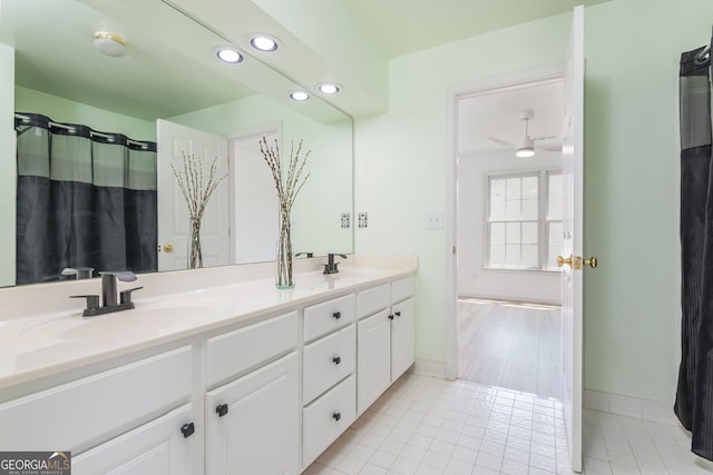 2635 Stonehill Dr, Cumming, GA 30041 - bathroom featuring a sink, recessed lighting, tile patterned flooring, and double vanity