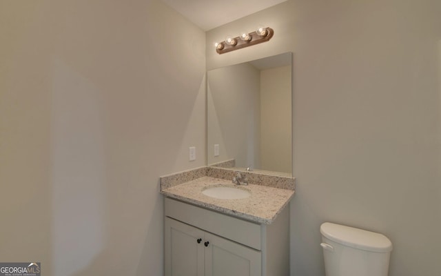 unfurnished bedroom featuring visible vents, baseboards, carpet floors, and a closet