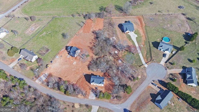 bird's eye view with a rural view