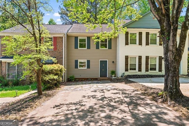 view of front of property featuring brick siding