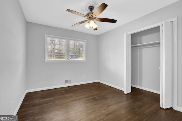 1093 Lanier Dr SW, Marietta, GA 30060 - unfurnished bedroom with wood finished floors, baseboards, and visible vents